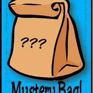 May include: A brown paper bag with a folded top and question marks on the front. The bag is on a blue background with the text "Mystery Bag!" below it.