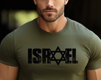 May include: A green t-shirt with a black print of the word "ISRAEL" and a Star of David.