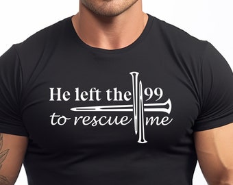 Puede incluir: Camiseta negra con texto blanco que dice "He left the 99 to rescue me". El texto está acompañado de una imagen estilizada de una cruz con clavos.