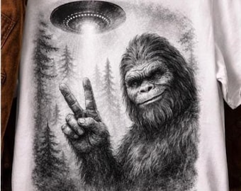 Funny Bigfoot UFO Shirt, Sasquatch Alien Tee, Peace Sign Bigfoot Shirt, Believe Shirt, Conspiracy Graphic Tee, Gift for Him