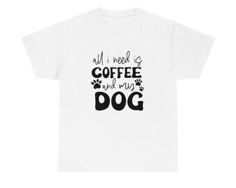 May include: White t-shirt with black text that reads "all i need is COFFEE and my DOG" with paw prints around the text.