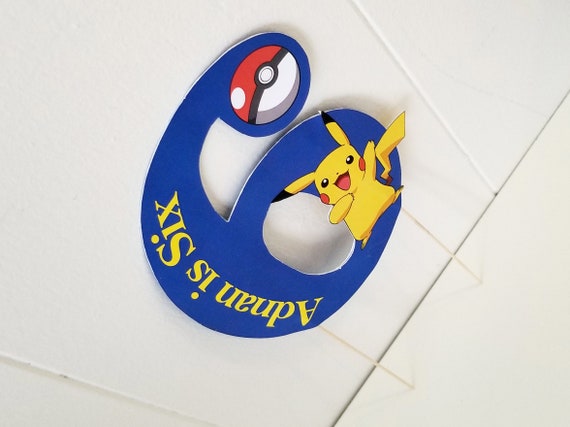 Personalised Name & Age Pokemon Birthday Glitter Cake Topper Blue and Yellow 