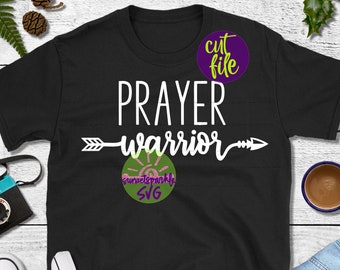 May include: Black t-shirt with white text that reads "PRAYER warrior" with an arrow pointing to the right. A green circle with a sun and the text "sunsetsparkles SVG" is on the shirt.