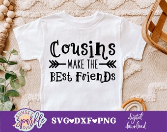 May include: White t-shirt with black text that reads "Cousins Make The Best Friends" with a black arrow pointing to the right on each side of the text.