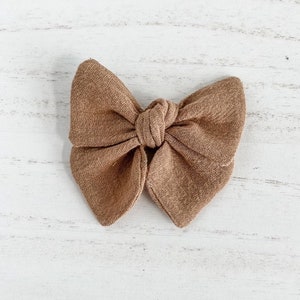 Brown Sugar Bow on Nylon Headband, Clip, or Clip on Bowties for babies and toddlers - Customizable Bow Type & Size