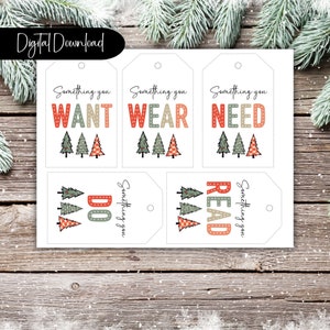 Può includere: Quattro etichette regalo stampabili con un design a forma di albero di Natale. Ogni etichetta ha una frase diversa: Qualcosa che VUOI, Qualcosa che INDOSSI, Qualcosa di cui HAI BISOGNO, Qualcosa che LEGGI.