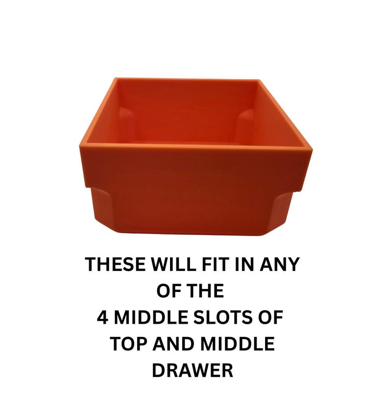 May include: An orange plastic storage bin with a rectangular shape. The bin has a slightly flared top and a stepped base. Text on the image reads: "THESE WILL FIT IN ANY OF THE 4 MIDDLE SLOTS OF TOP AND MIDDLE DRAWER."
