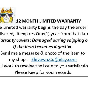 May include: A white card with text detailing a 12-month limited warranty. The warranty covers damage during shipping or defects. Includes a cartoon cat wearing sunglasses and the shop's Etsy address.