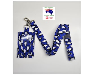 Penguin pattern lanyard with ID card/badge holder, breakaway safety clip and antique brass swivel clip. Free post with tracking Australia.