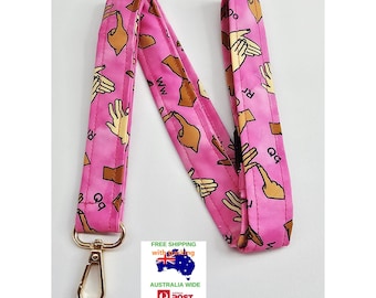 Handmade Auslan/BSL fingerspelling alphabet lanyard (pink)with gold swivel clip and breakaway clip. Free postage in Australia.