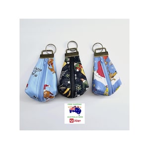 ポップカルチャーのクリスマス柄キーホルダー小銭入れポーチ。商品は個別に販売されます。オーストラリア国内送料無料。