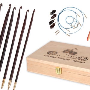 May include: A set of wooden circular crochet needles in a wooden box with the text "Circular Crochet Needles" engraved on the lid. The set includes 7 needles of different sizes and a crochet hook.