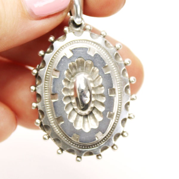 Antique Victorian sterling silver aesthetic oval shaped locket pendant. Birmingham hallmarks