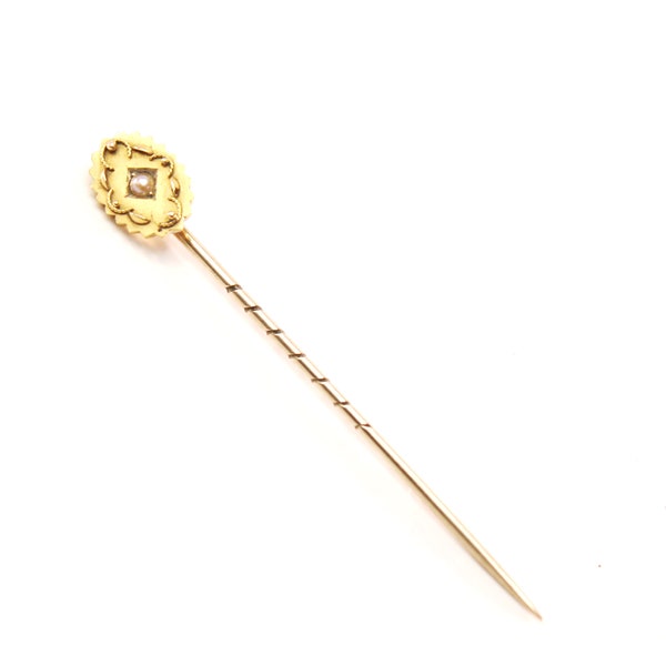 Antique Victorian 15ct gold Etruscan style stick pin adorned with a pearl