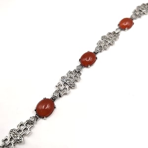 Art Deco silver bracelet, stunning elegant piece decorated with marcasite gemstones.