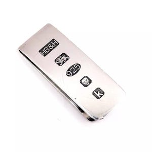 Sterling silver money clip. London hallmarks dated 2009