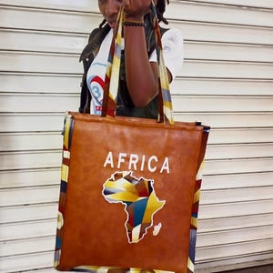 Afrikanische lederne Tragetasche, handgemachte Laptoptasche, schwarze moderne afrikanische Tragetasche, stilvolle Tragetasche, braune Mädchentasche, Reisetasche.