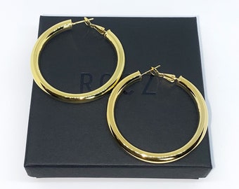 Large chunky gold hoop earrings, thick gold hoop earring, thick tube hoop earrings, hollow gold hoop earrings, 50 mm wide gold hoops.