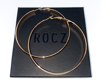 Gold hoop earrings. 9k rose gold filled hoops. Large hoop earrings. Lightweight and dainty hoops. 65mm diameter 5mm wide. Rose gold earrings