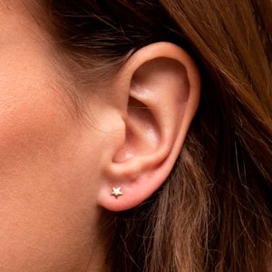 Gold star ear studs. Solid gold stud earrings. 14k gold star earrings sold as a pair with butterfly backs. Minimalist gold studs. Gift.