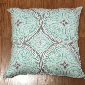 Funda de almohada decorativa para exteriores.