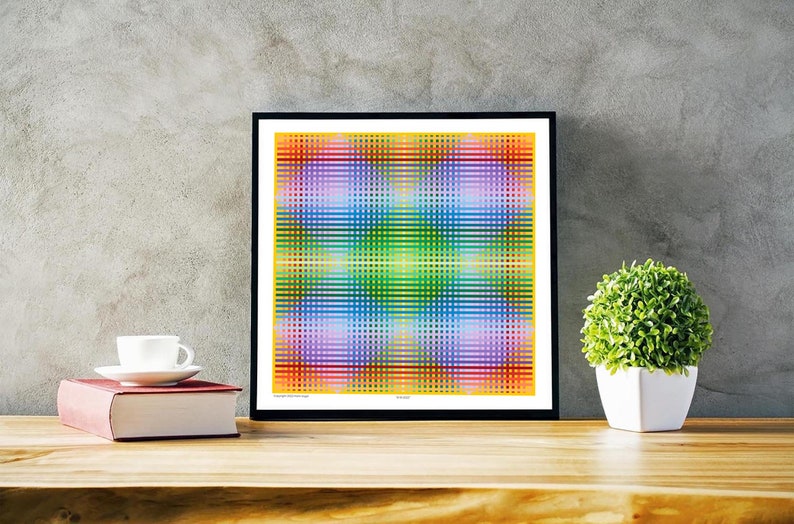 May include: A framed print of a colorful abstract geometric design with a grid pattern in shades of red, orange, yellow, green, blue, purple, and pink.