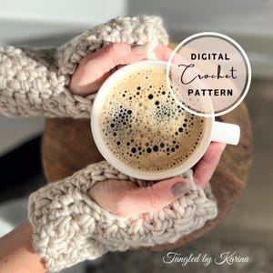 May include: A pair of beige crochet fingerless gloves are being worn by a person holding a white mug of coffee. The text "DIGITAL Crochet PATTERN" is in a circle on the image. The text "Tangled by Karina" is at the bottom of the image.