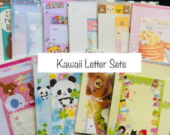 May include: A collection of Kawaii letter sets featuring various designs, including animals, music, and food. The sets are colorful and feature a variety of cute characters.