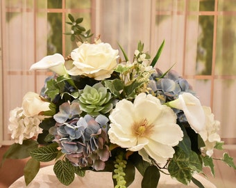 Blue and Cream Silk Floral Designs with Magnolias Hydrangea and Succulents in Silver Bowl