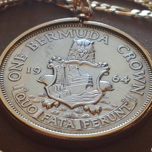 Original 1964 Bermuda Queen Elizabeth II Silver Dollar coin Pendant set on a 24" Gold Filled Figaro Chain. 36mm diameter coin pendant.
