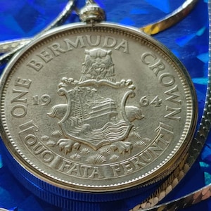 Original 1964 Bermuda Queen Elizabeth II Silver Dollar coin Pendant set on a 20" Sterling Herringbone Chain. 35mm diameter coin pendant.