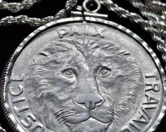 1965 Congo Lion coin hammered sterling silver bezel pendant Justice Paix Travail set on a 24" Italian Sterling Silver rope chain. 31mm
