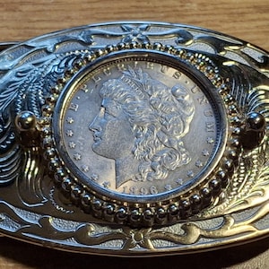 Antique 1896 USA Morgan 900 Silver dollar and Gold Plated Surgical Steel Cowboy Belt Buckle.  3&quot;x2.5&quot;, fits up to a 44mm belt.