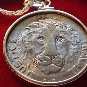 Rare Special  1965 African Congo Lion coin pendant Justice Paix Travail set on an 18" Italian Sterling Silver rope chain. 31mm