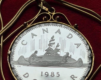 10k Gold bezel .417 pendant Canada Pendant 1985 Canadian Voyager Canoe Dollar gold plated sterling overlay chain with box & coa