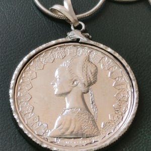 Italian Renaissance Silver 500 Lire Coin pendant on a 24&quot;  sterling silver Italian snake chain. 31mm diam.