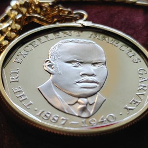 1976 Jamaica Coin Pendant Necklace, The RT Excellent Marcus Garvey, set on a gold filled bezel and a 24&quot; 18kgf Gold Filled Figaro chain 31mm