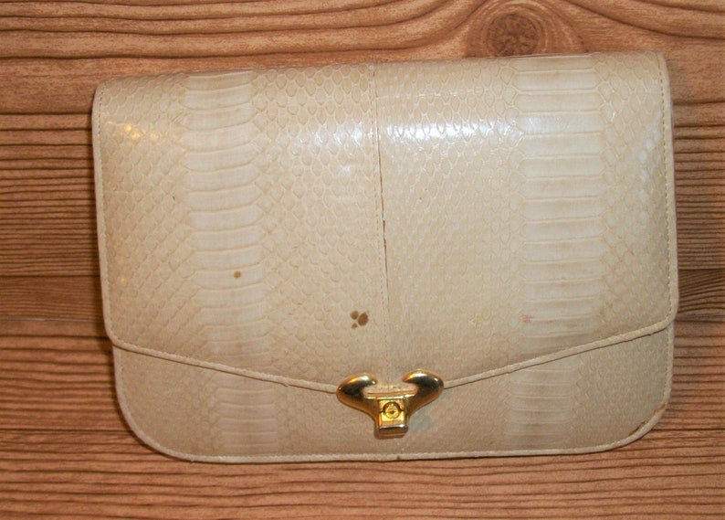 tan snakeskin bag