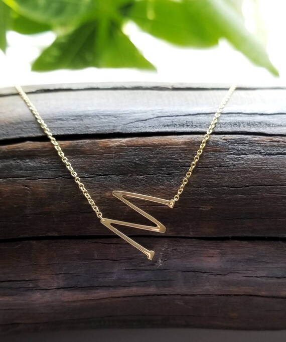sideways m initial necklace