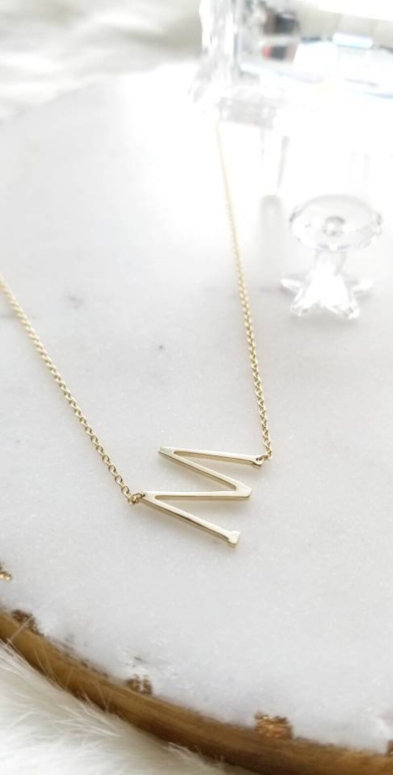 Sideways m initial necklace Clearance