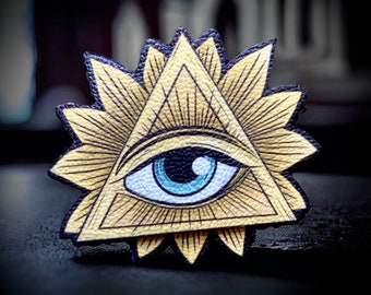 Broche. Oeil Sacré