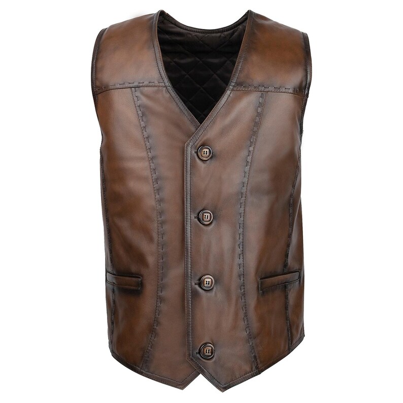 Discover the timeless elegance and rugged charm of our Men's Leather Vest, Soft Brown Leather Waistcoat, a true testament to craftsmanship and style. Handmade in Turkey from 100% genuine lambskin, this leather vest offers unparalleled softness, flexibility, and breathability—making it perfect for both casual layering and more refined occasions. The classic fit ensures all-day comfort, while the Punto stitching details add a sophisticated, polished touch to this versatile piece.