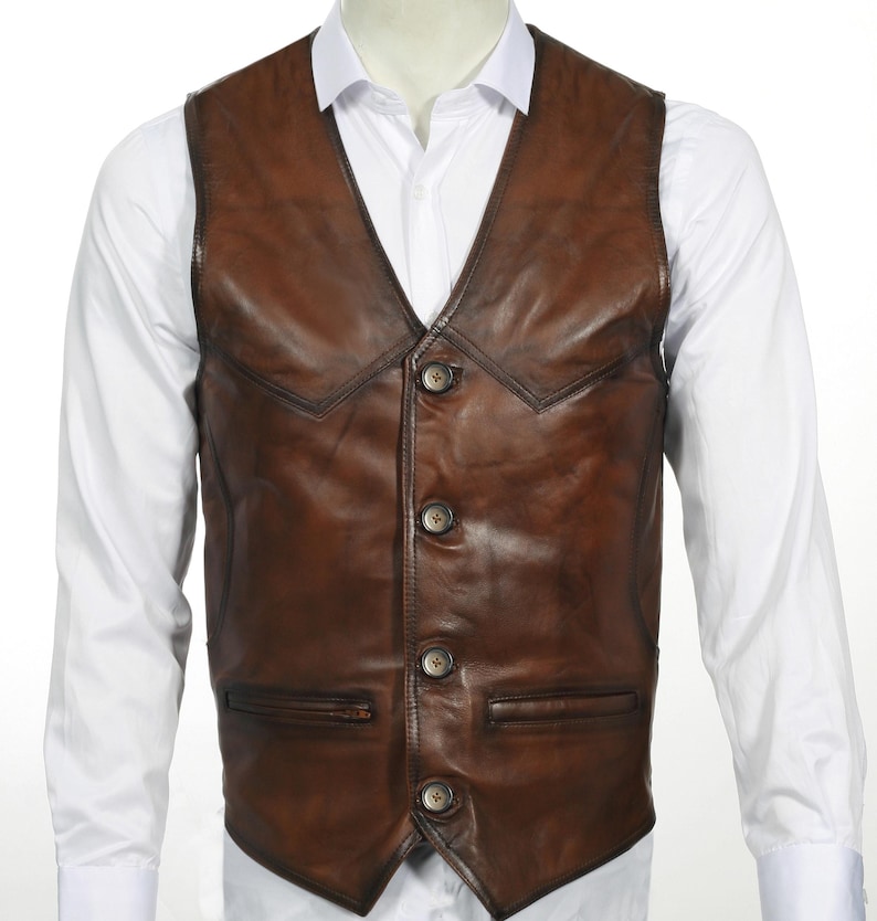 Elevate your style with this handcrafted Leather Vest Men in rich brown sheepskin. Perfect for cowboy, biker, motorcycle, or western fashion enthusiasts, this waistcoat blends timeless appeal with superior craftsmanship. Made from 100% genuine lamb leather, it offers a luxuriously soft feel and durable wear that ages beautifully over time.