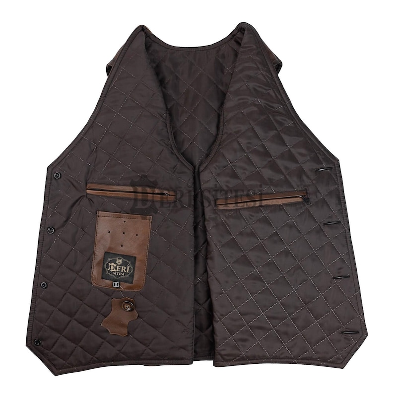 May include: A dark brown quilted vest featuring a V-neckline, a button-front closure, and two horizontal zippered pockets. The interior lining displays a diamond-stitched pattern, a brown leather patch with the text DERI SITESI, and a size S label.