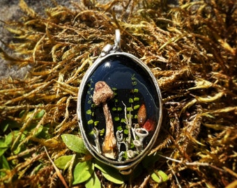 Pendant made of a mushroom and lichen