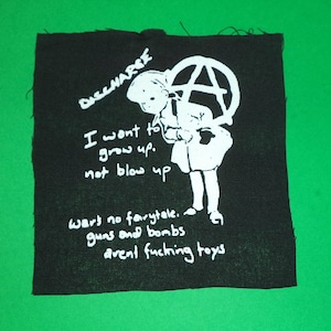 punkmärken - punkband - punkaccessoarer - antifamärken - sy-på-märken - anarkopunkmärken - anarkimärken - punkkläder - punkrock