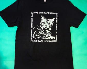 Kattenshirt, brutale stijl, anarchieshirt, punkshirt, punkrock, punkkleding, punkbands, politiek shirt, solidariteitsshirt, doe-het-zelf-shirt, Antifa-shirt