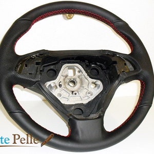 coprivolante Fiat Bravo in vera pelle nera traforata