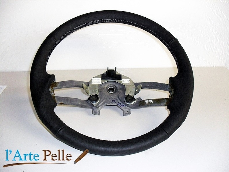 Coprivolante Alfa Romeo 147 vera pelle nera