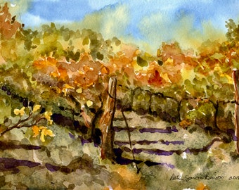 May include: Watercolor painting of a vineyard in autumn. The artwork depicts rows of grapevines with brown and yellow leaves, a wooden fence, and a blue sky. The artist's signature and the year 2018 are visible.